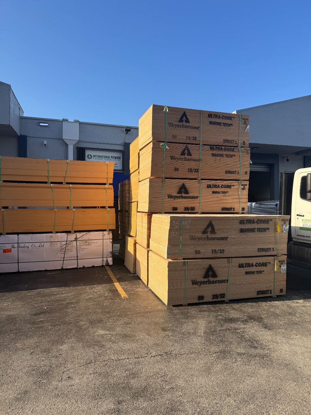 Weyerhaeuser Ultra-Core Marine Tech plywood pallets outside International Plywood lumber yard in Doral FL